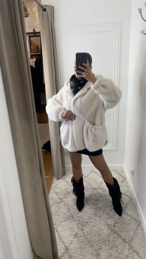 Manteau fausse fourrure poches élastiques